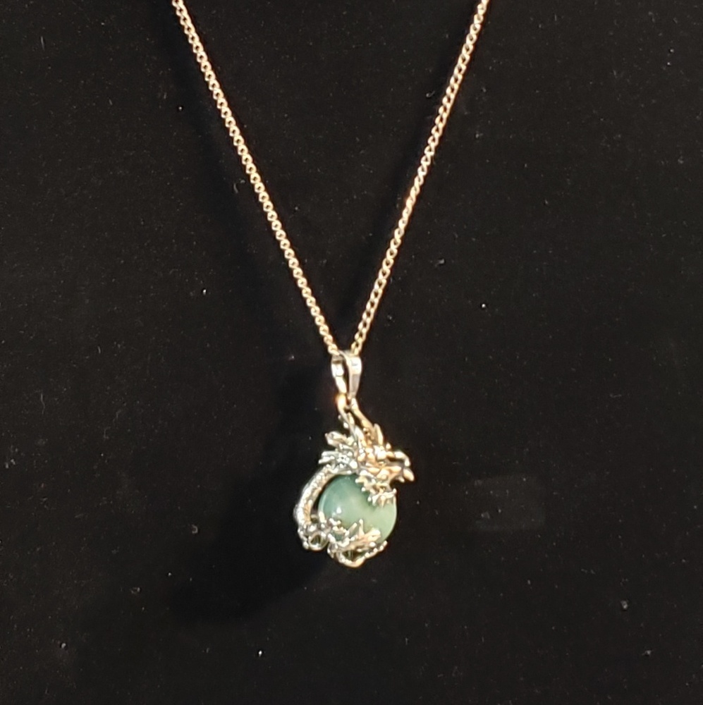 Stainless Steel Necklace With Dragon Holding